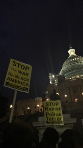 Capitol Police watch the crowd as protestors arrive at the steps of the US Capitol